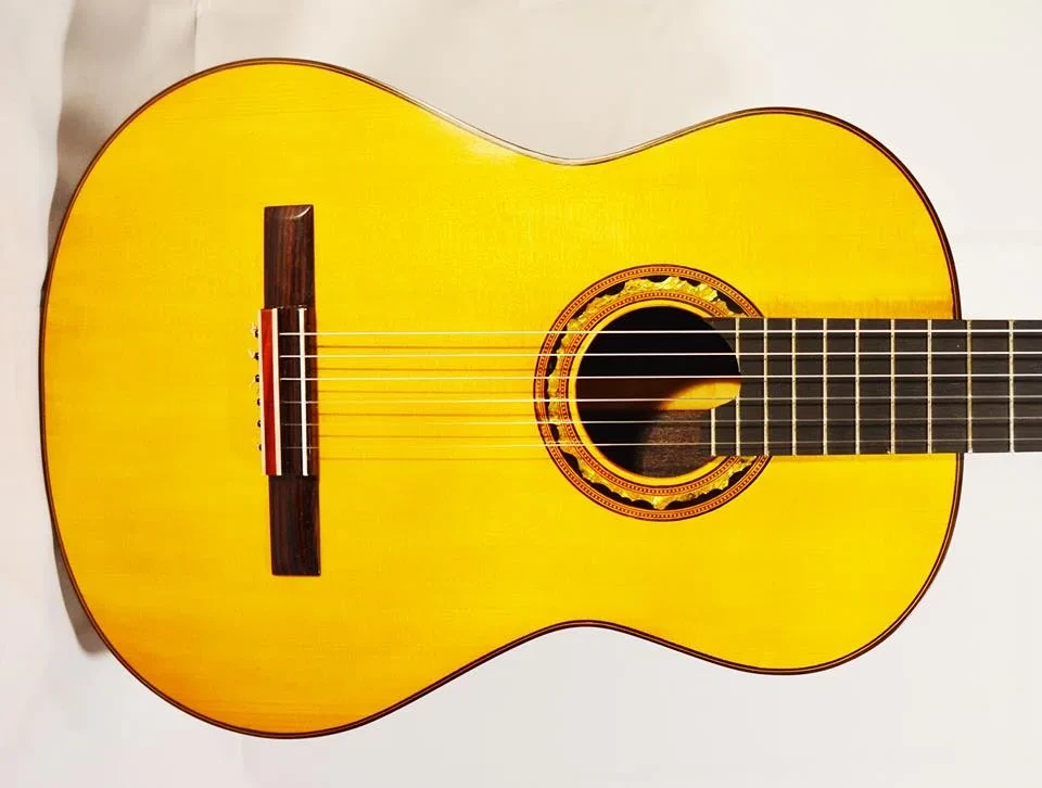 Guitarra desmontable abeto y palosanto india artesanal